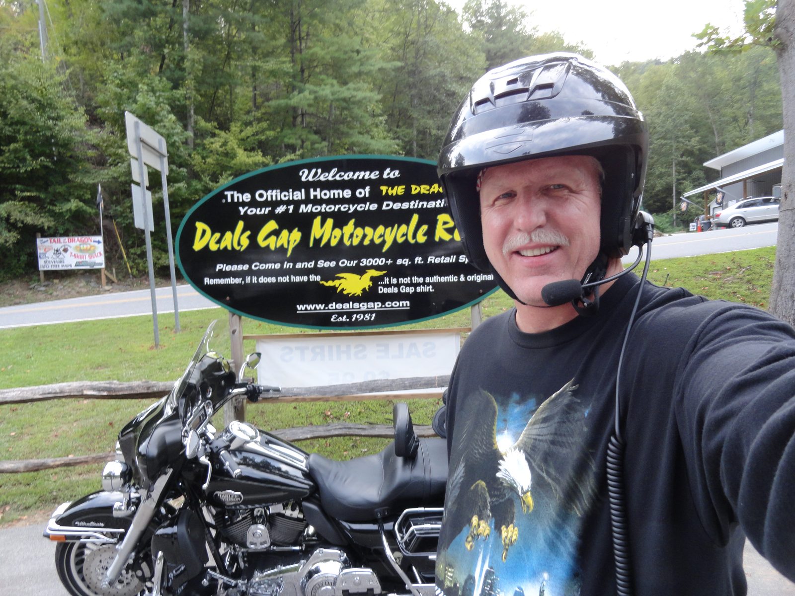 Tom Hughes on his Harley at the Deals Gap Motorcycle Resort sign