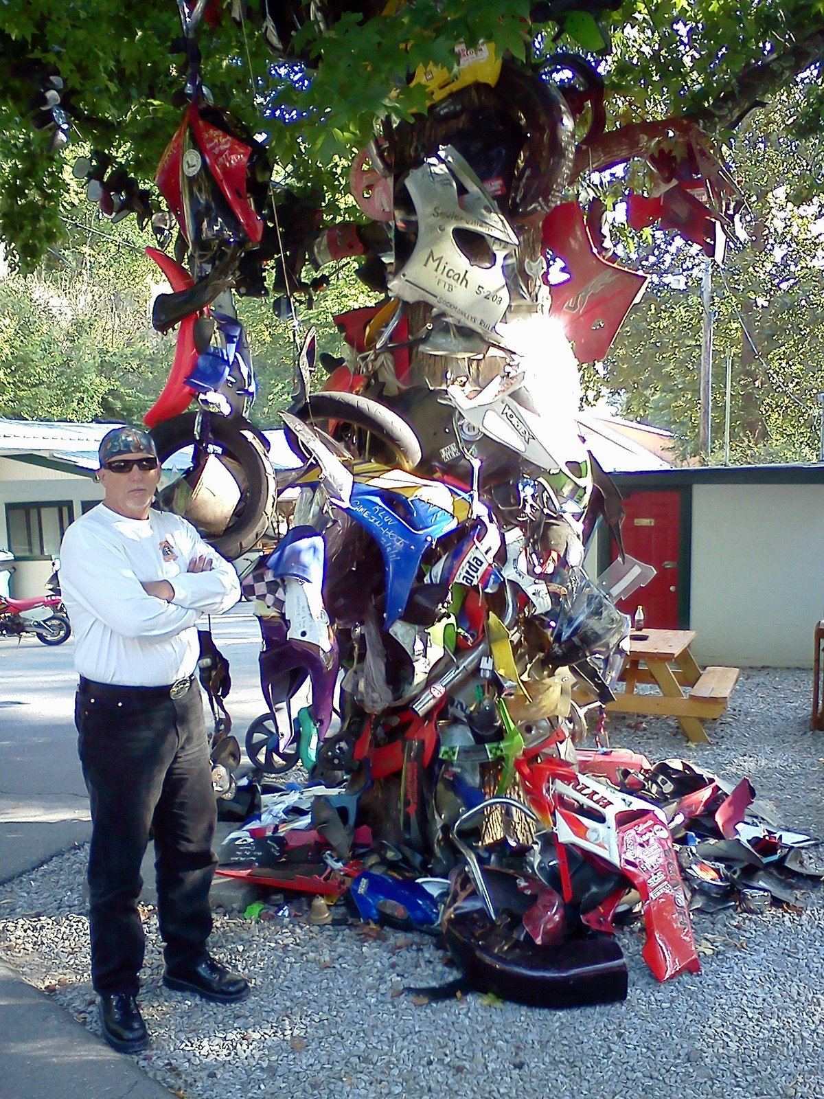 Tom Hughes beside the Tree of Shame memorial at Deals Gap
