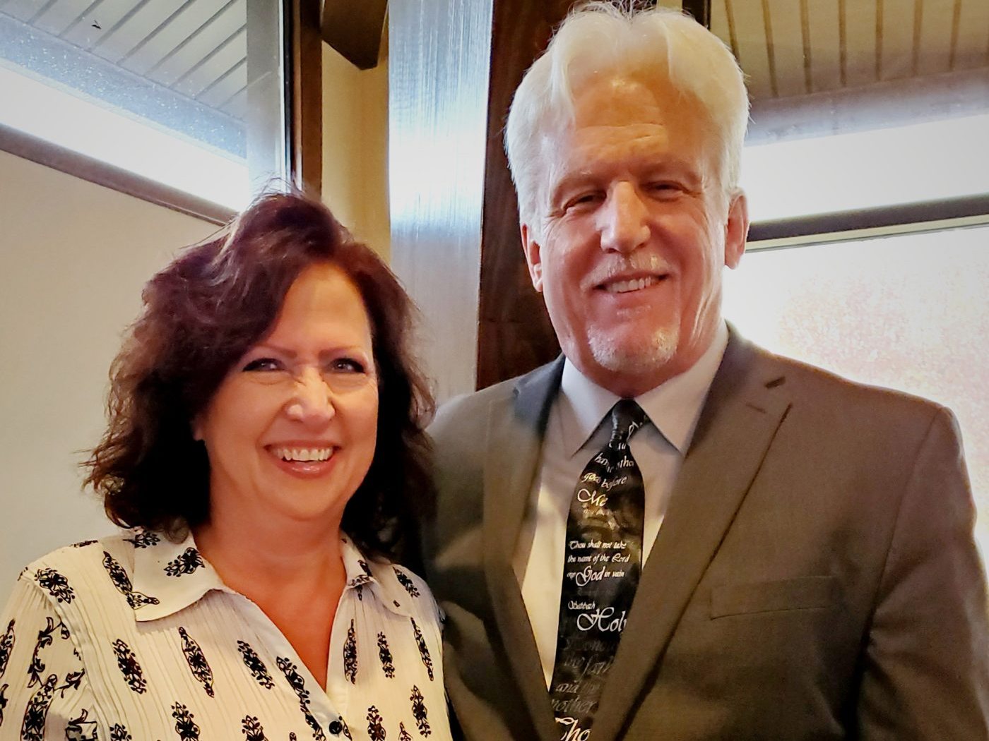 Tom and Cathy Hughes together at church, close up